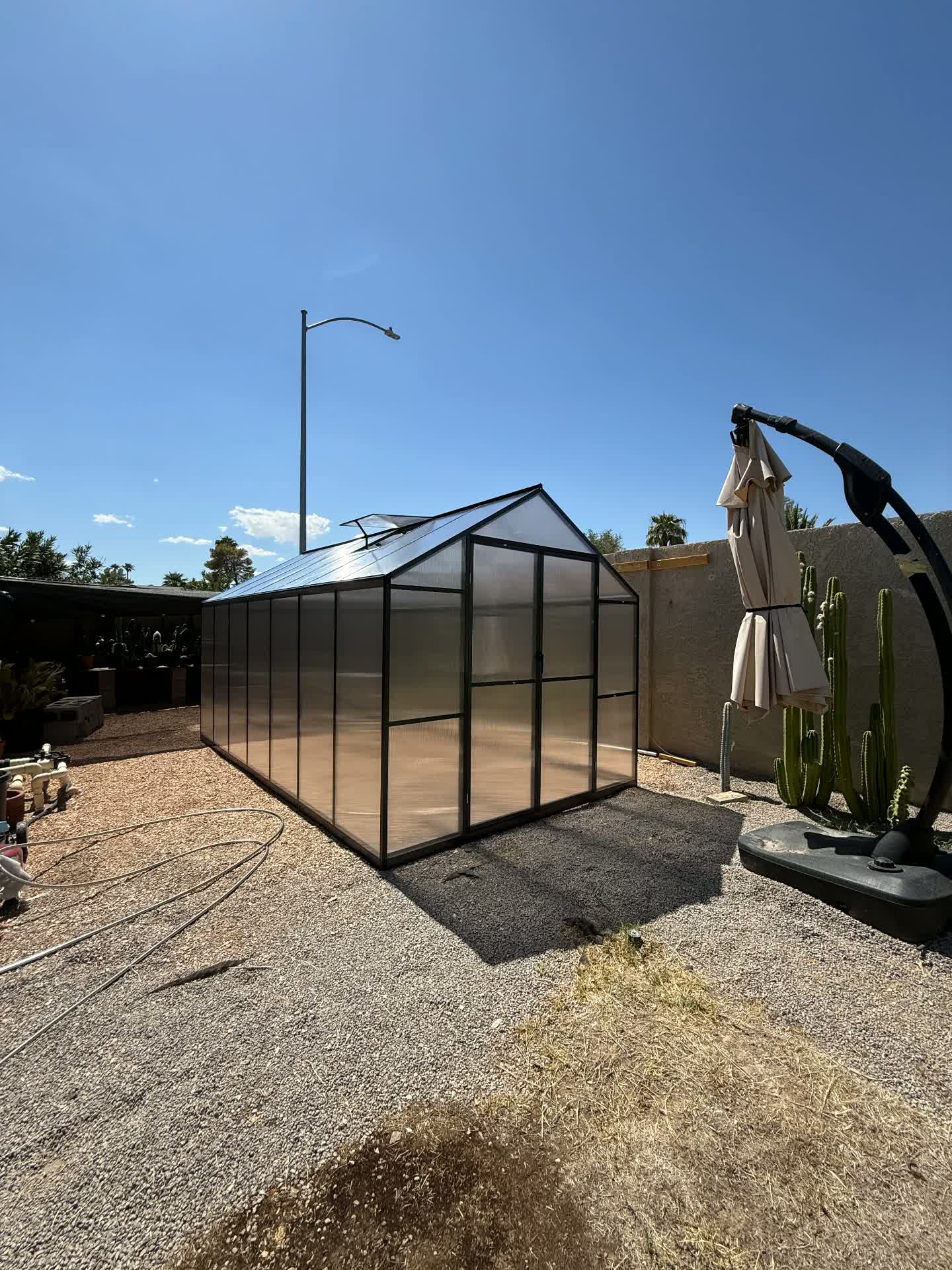 Backyard Polycarbonate Greenhouse — after assembly