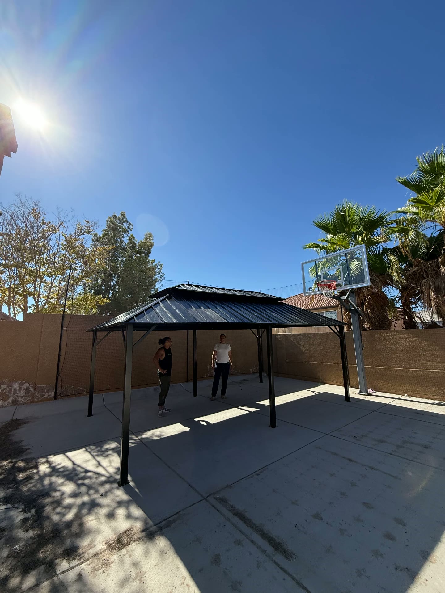 Hardtop Gazebo Over Backyard Court — after assembly